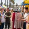 San Diego shoppers exploring ethical handmade apparel at local artisan market