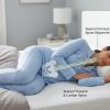 White adjustable loft pillow on a bed showing memory foam layers inside.