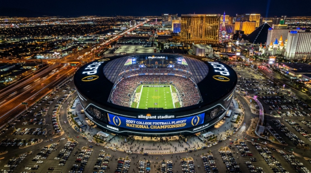 Aerial view of Allegiant Stadium in Las Vegas, Nevada, lit up for the 2027 College Football Playoff National Championship game on January 25, 2027