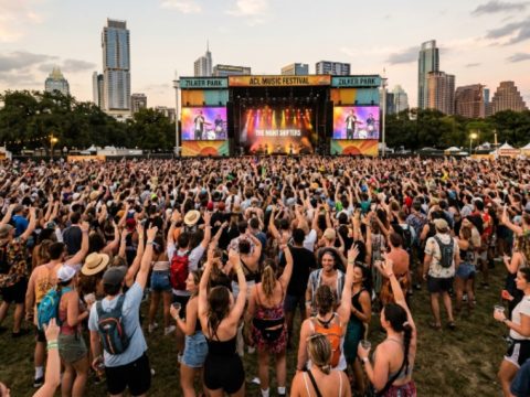 Crowd enjoying live music at Zilker Park during a festival weekend