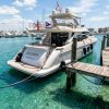 Yacht securely tied with heavy dock lines at a Florida marina.