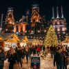 Glowing Christmas market stalls at Bethlehem Christkindlmarkt 2026 with the Bethlehem Steel blast furnaces in the background