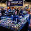 Colorful reef corals on display at the Reefing USA Nashville Coral Expo 2026 vendor tables
