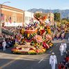 Colorful floral floats moving along Colorado Boulevard during the Rose Parade in Pasadena on New Year's Day 2027